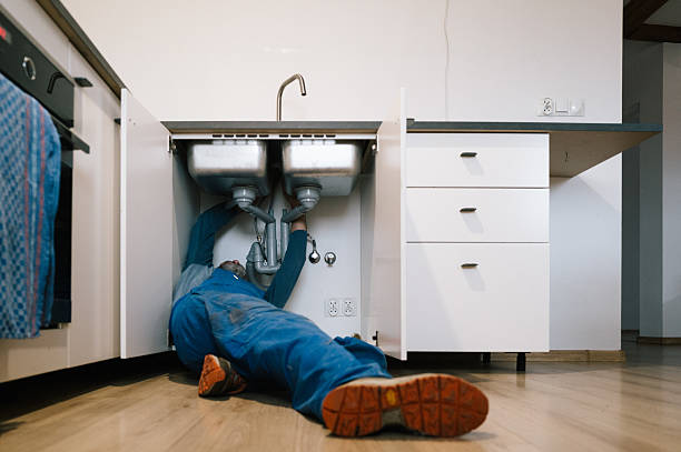 Professional Drain Cleaning technician working in Camden, NJ